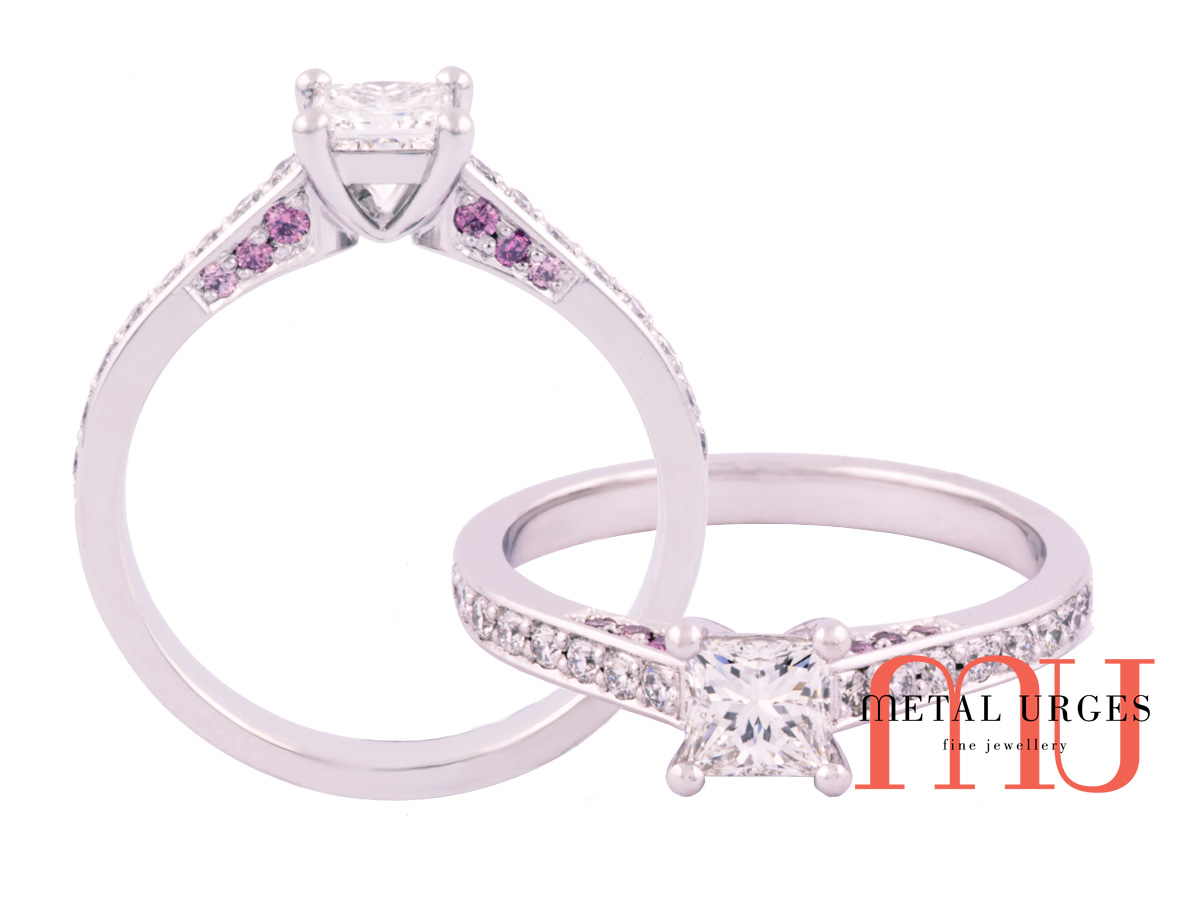 Princess cut engagement ring with Australian Argyle pink diamond detail in 18ct white gold.