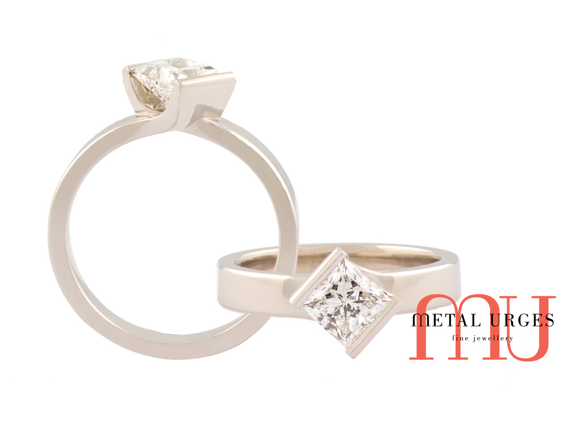 Princess cut white diamond tension twist engagement ring