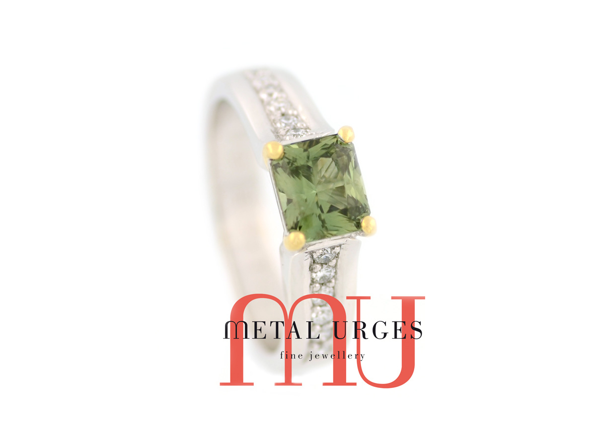 Natural green Madagascan sapphire and white diamond engagement ring in 18ct white gold. Custom made in Australia.