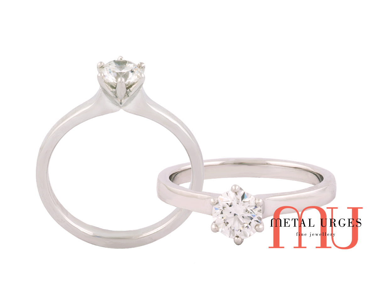 Timeless white diamond six claw white gold engagement ring.