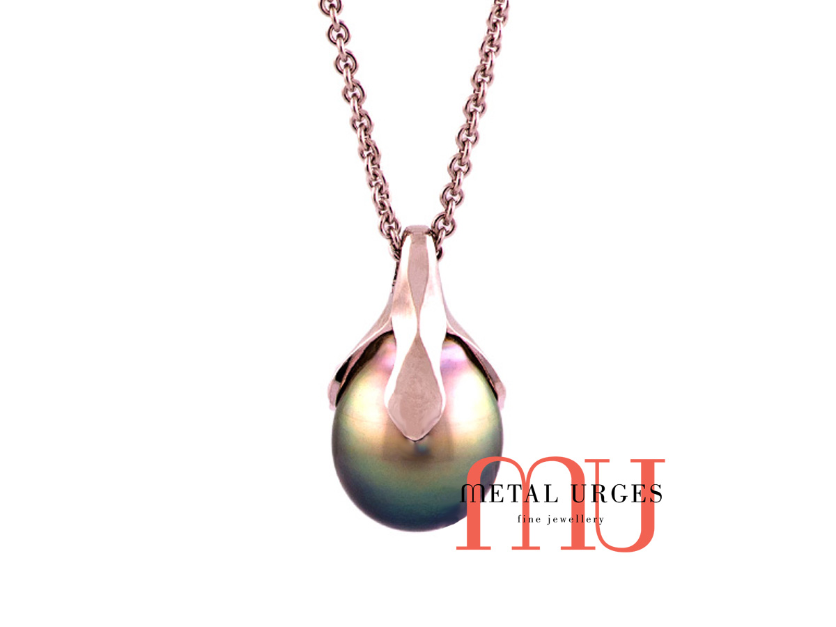 Simple black pearl organic style pendant of 18ct white gold.