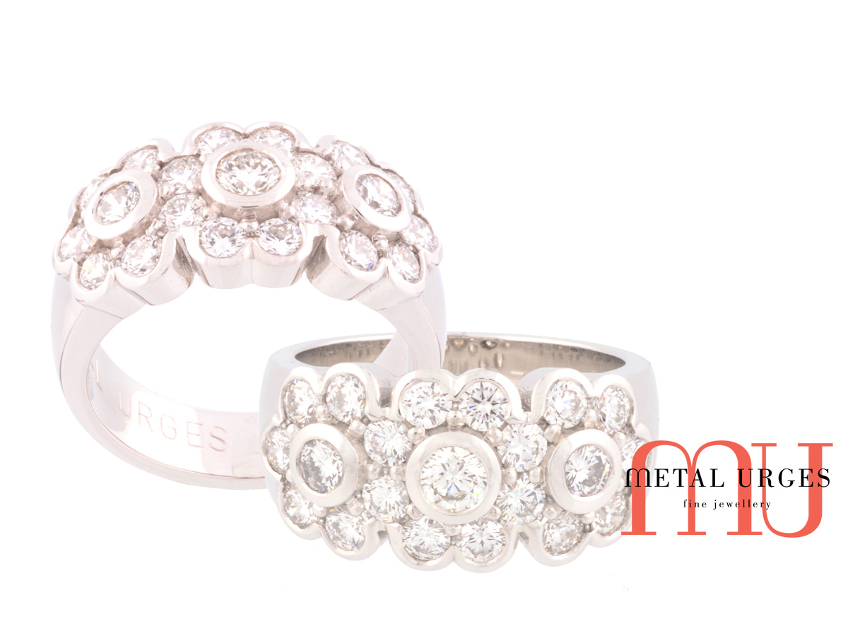 Art deco flower white diamond engagement ring set in 18ct white gold. Custom made in Australia.