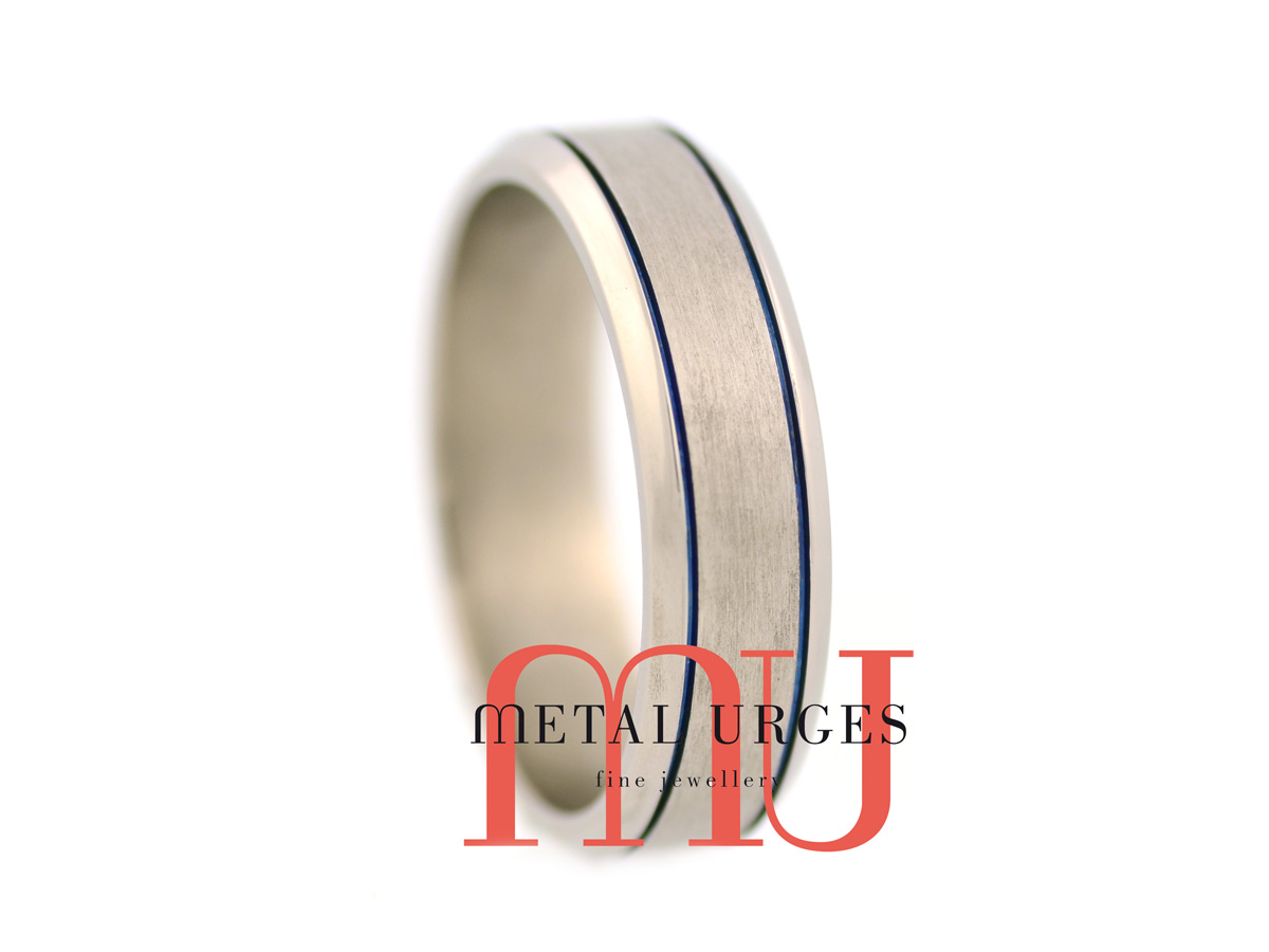 Brushed titanium wedding ring with blue grooves. Handmade by our Jewellers, in Hobart Tasmania.