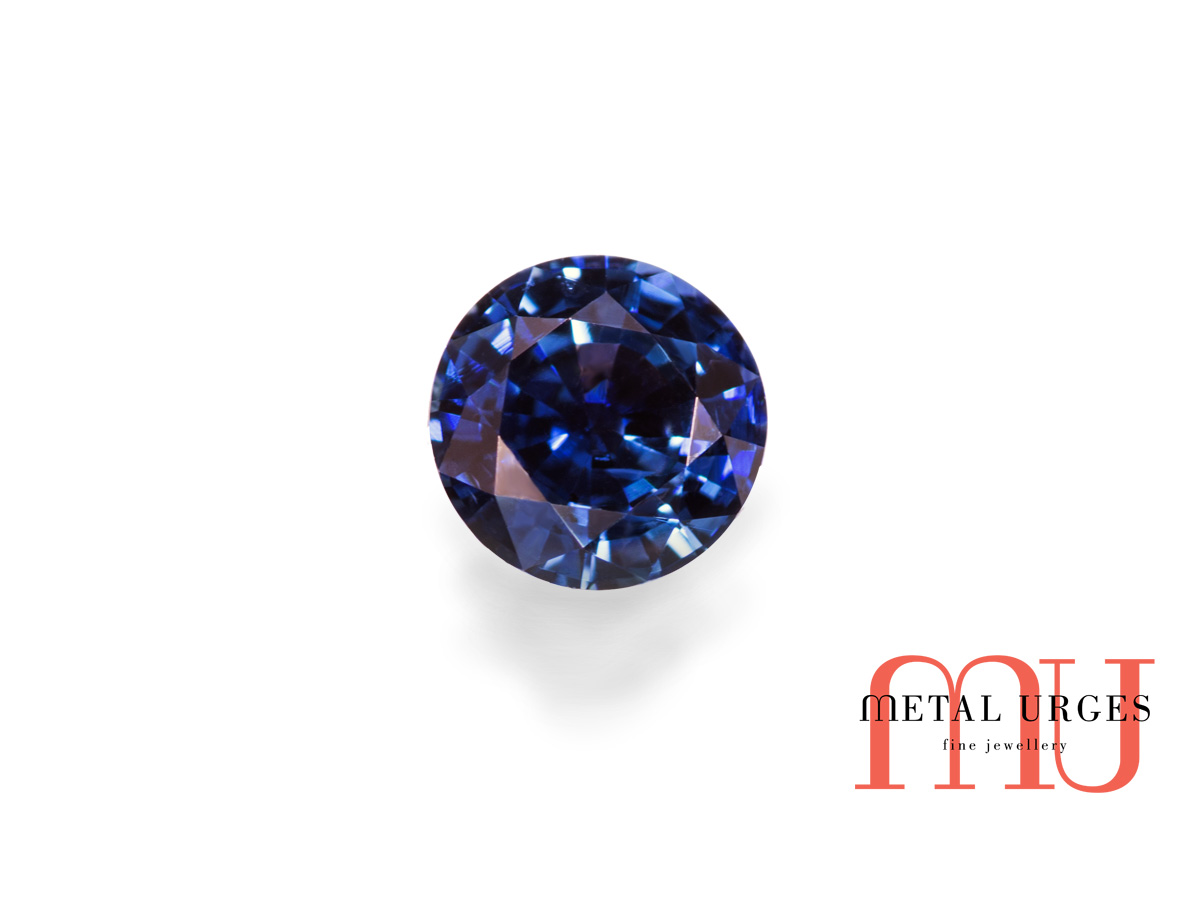 Natural round dark blue sapphire