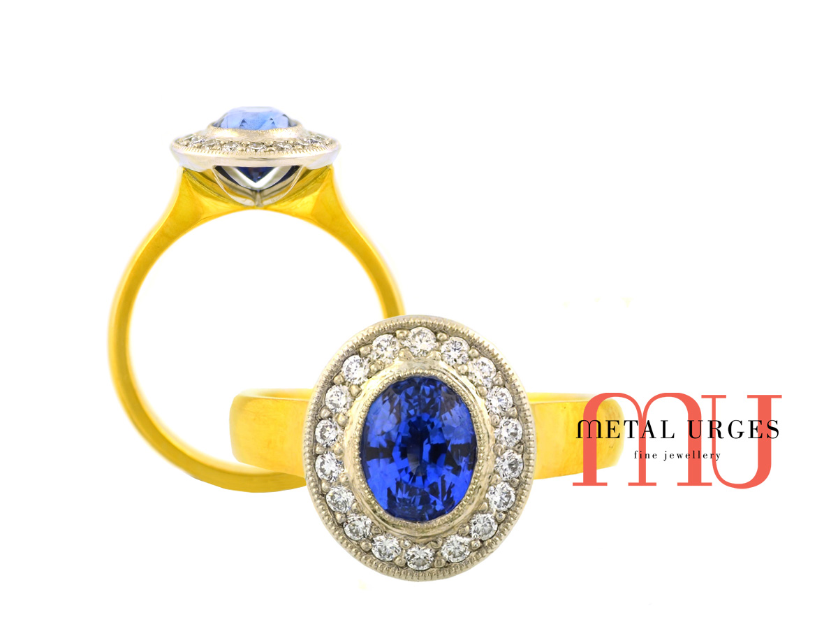 Intense blue natural sapphire and white diamond 18ct gold engagement ring. Custom made in Australia.