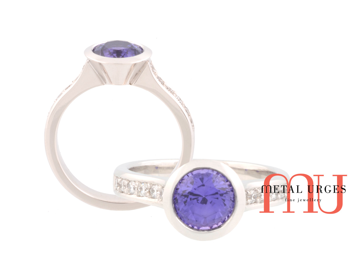 Blue sapphire and white diamond platinum engagement ring. Custom made in Australia.