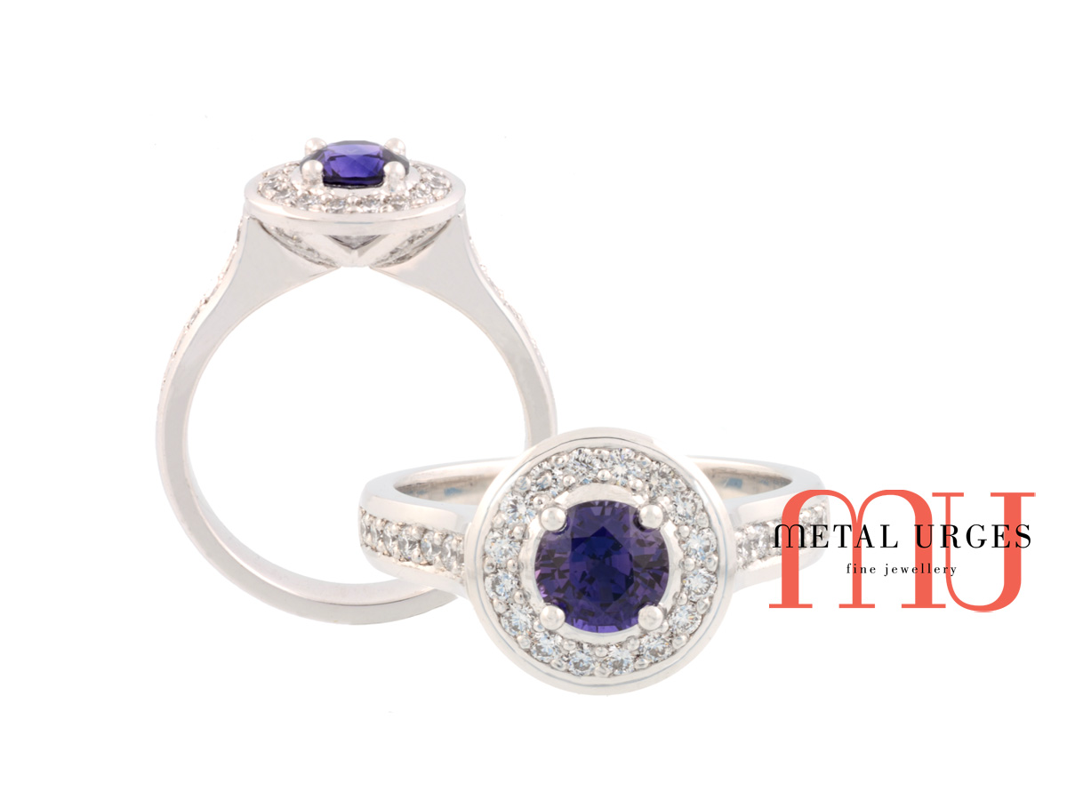 Vibrant natural blue sapphire and platinum engagement ring. Custom made in Australia.
