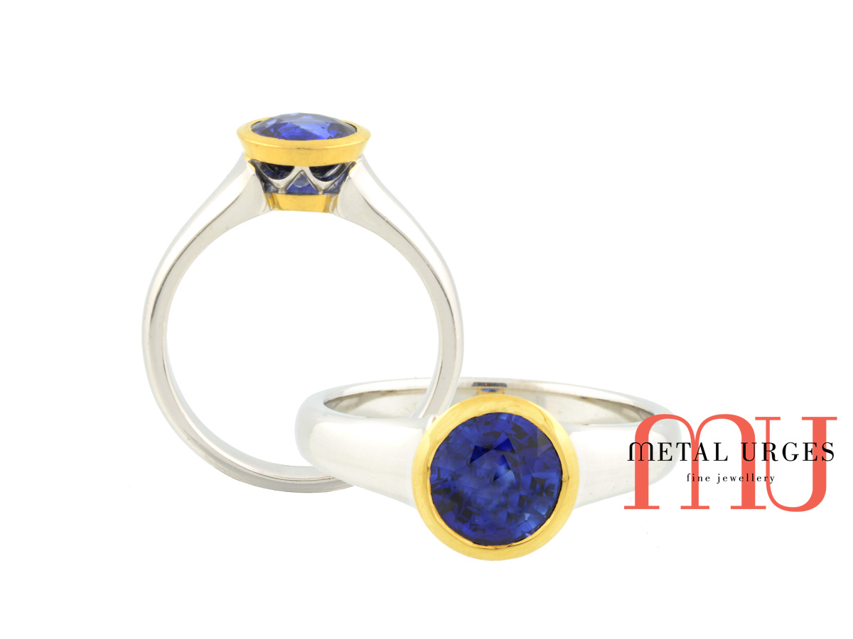Intense blue sapphire 18ct gold engagement ring. Custom made in Australia.