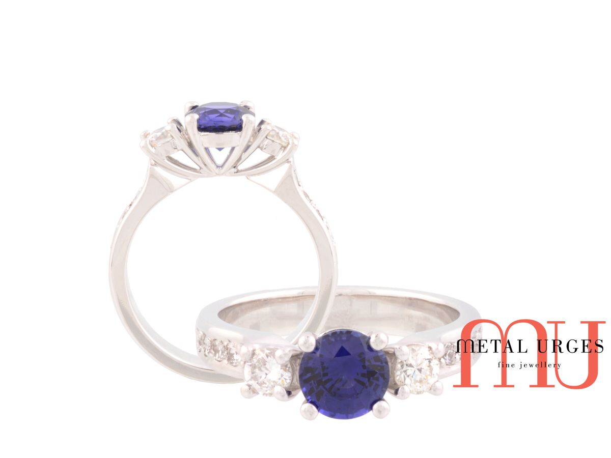 Deep blue sapphire and white diamond platinum engagement ring. Custom made in Australia.