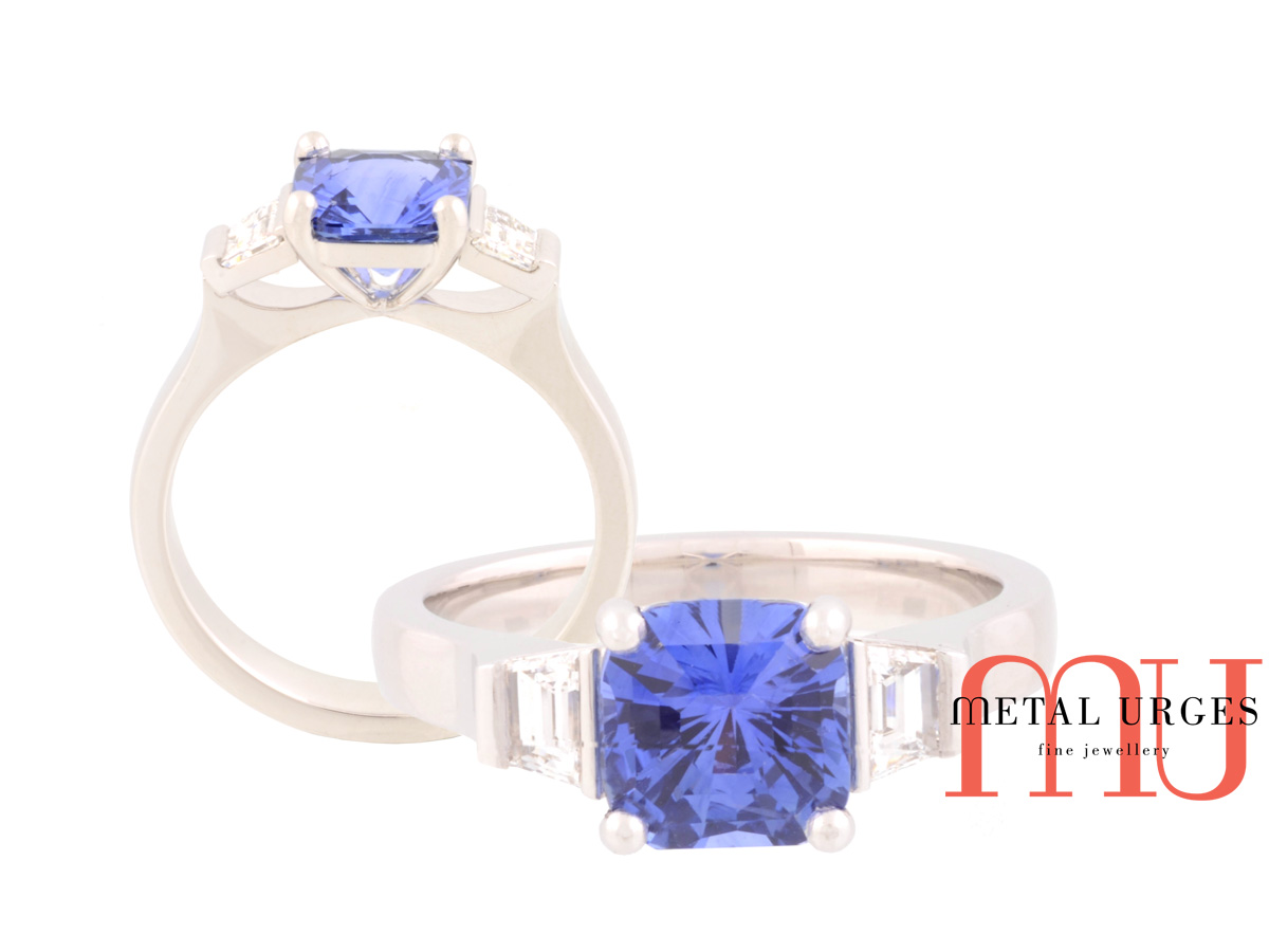 Vibrant blue sapphire and white diamond engagement ring in platinum. Custom made in Australia.