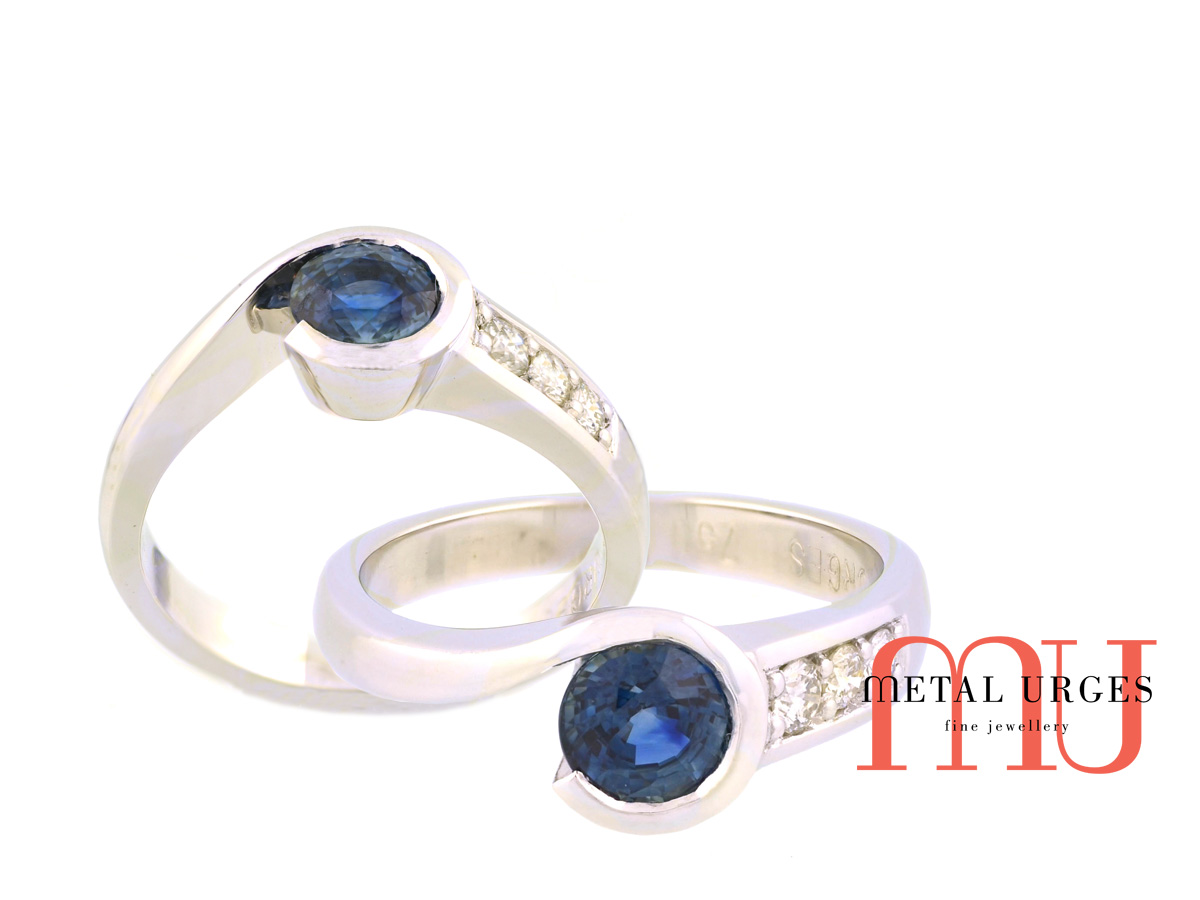 Rare intense blue Kashmir sapphire and white diamond engagement ring. Custom made in Australia.