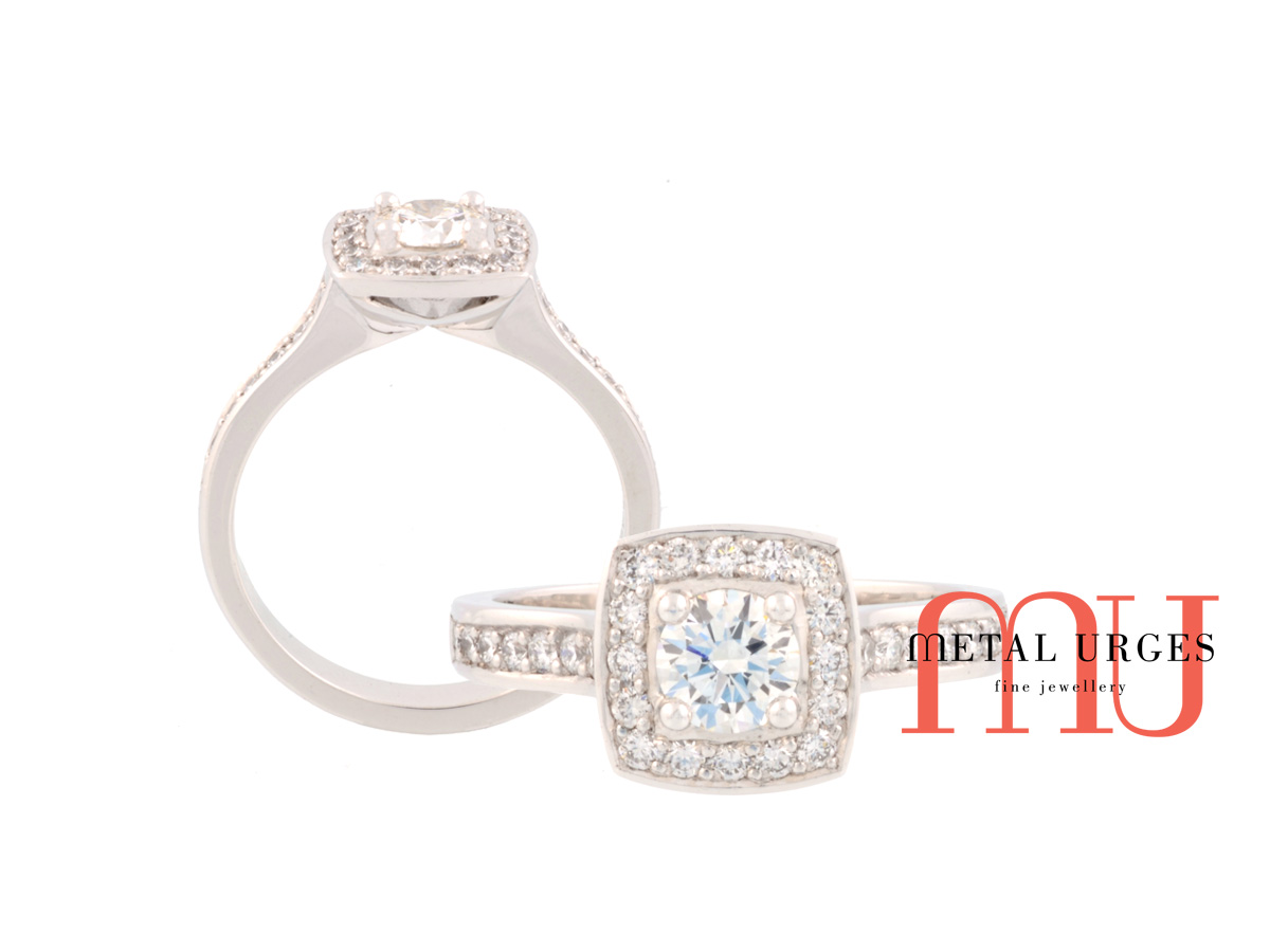 Platinum round brilliant cut white diamond modern halo cluster engagement ring. Custom made in Australia.
