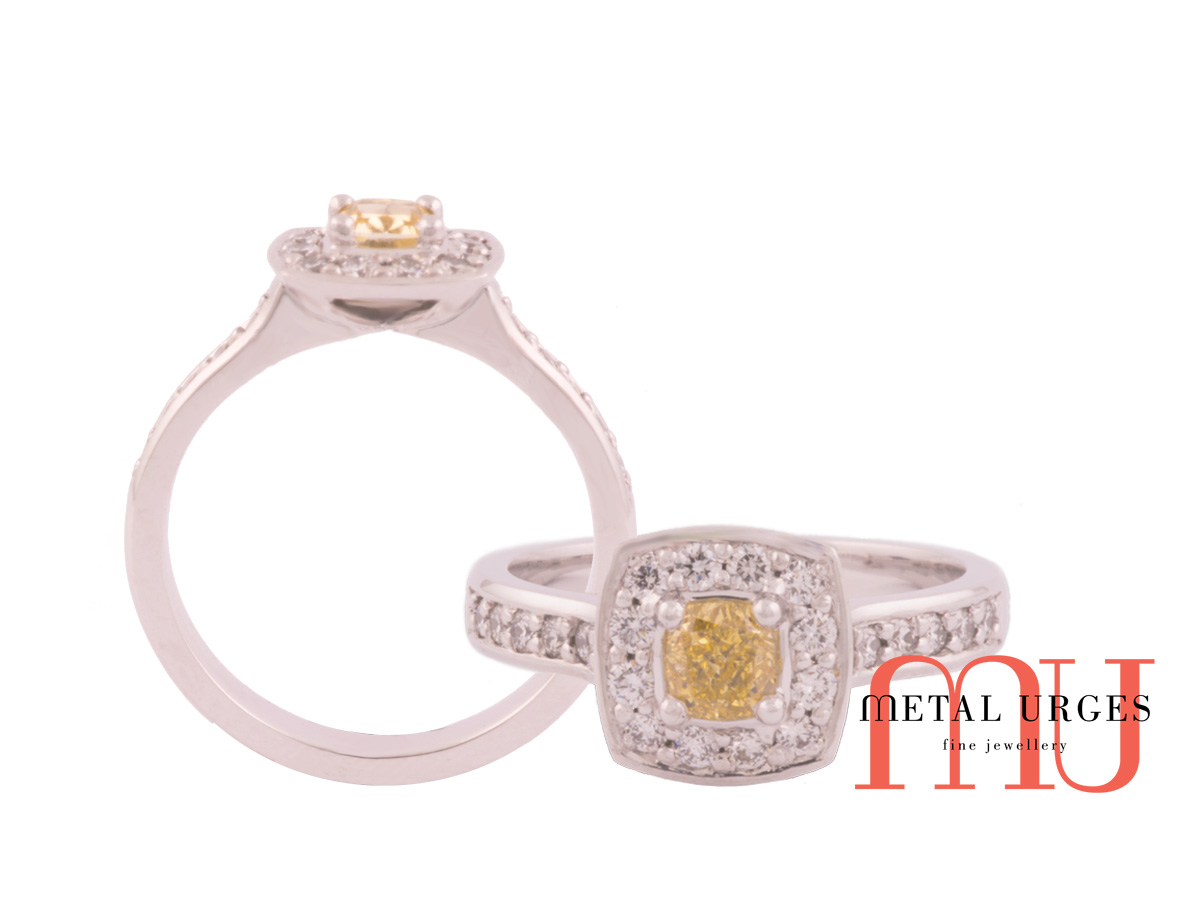 Cushion cut yellow diamond modern white diamond cluster ring in 18ct white gold