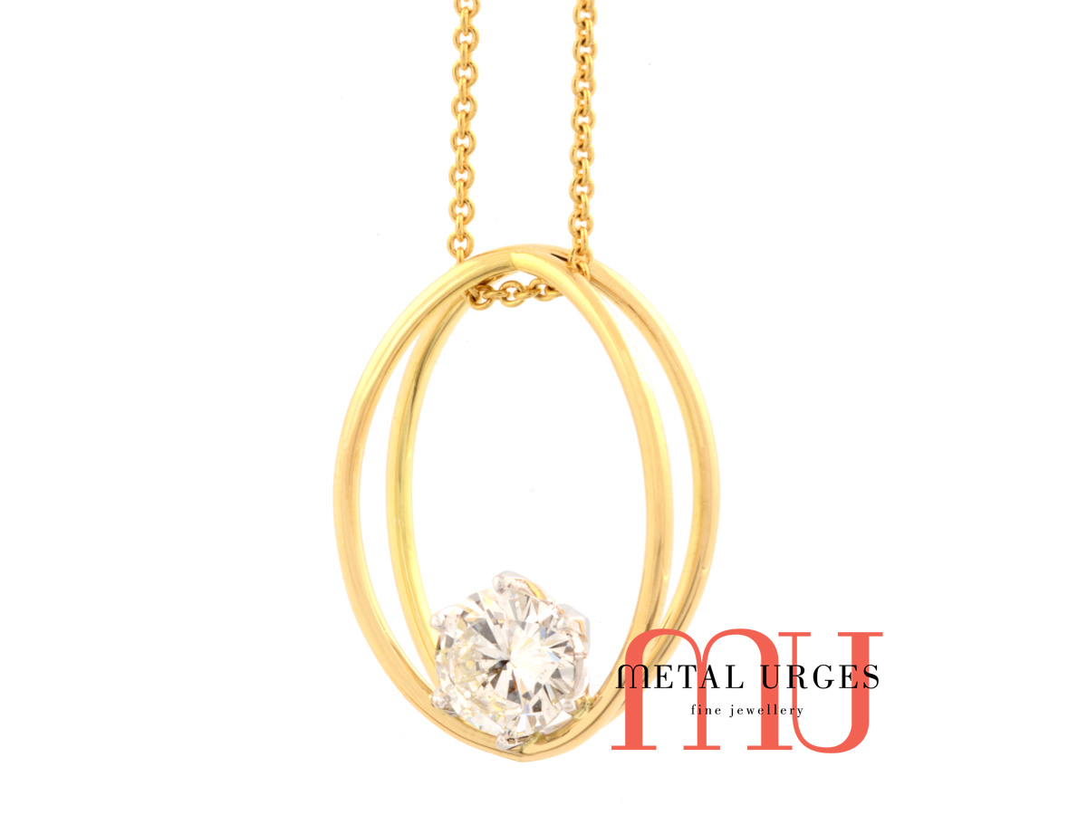 Unique white diamond and yellow gold pendant.  Handmade in Australia.