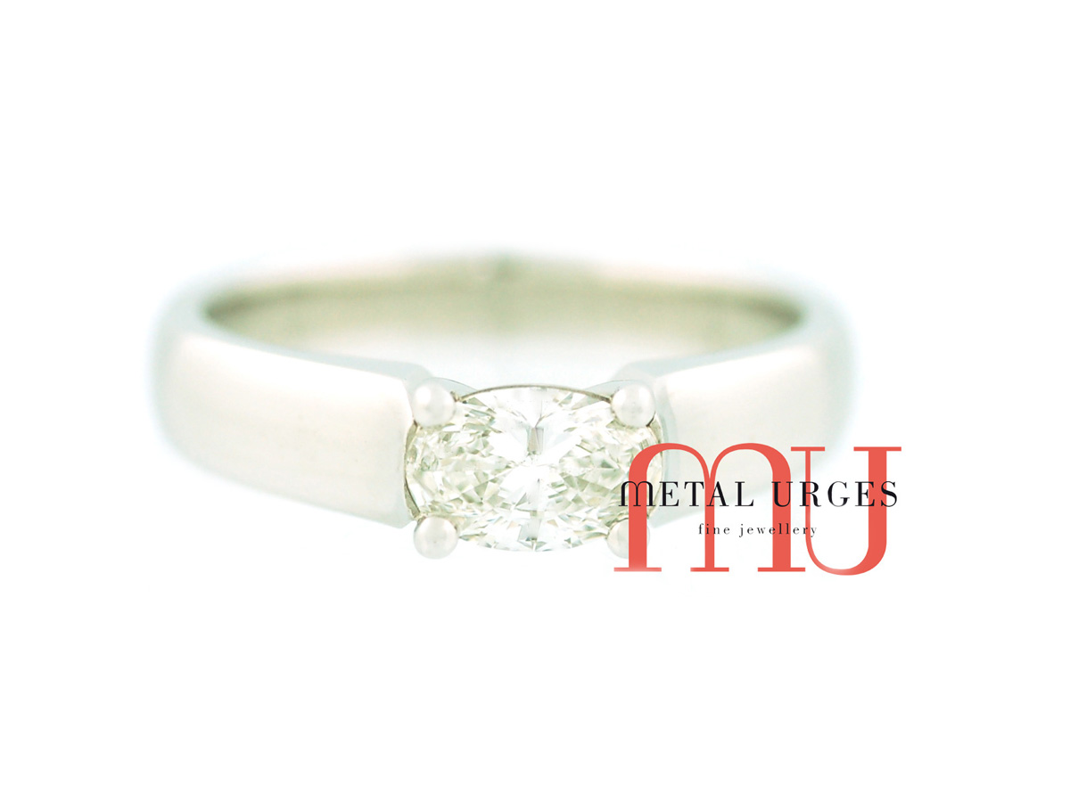 Oval white diamond engagement ring in 18ct white gold. Custom made in Australia.