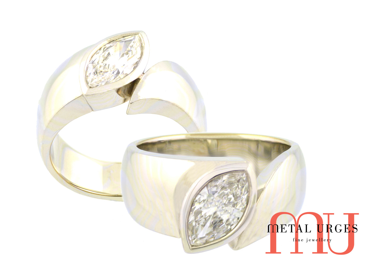 18ct white gold, bezel set marquise white diamond engagement ring.  Custom made in Hobart.
