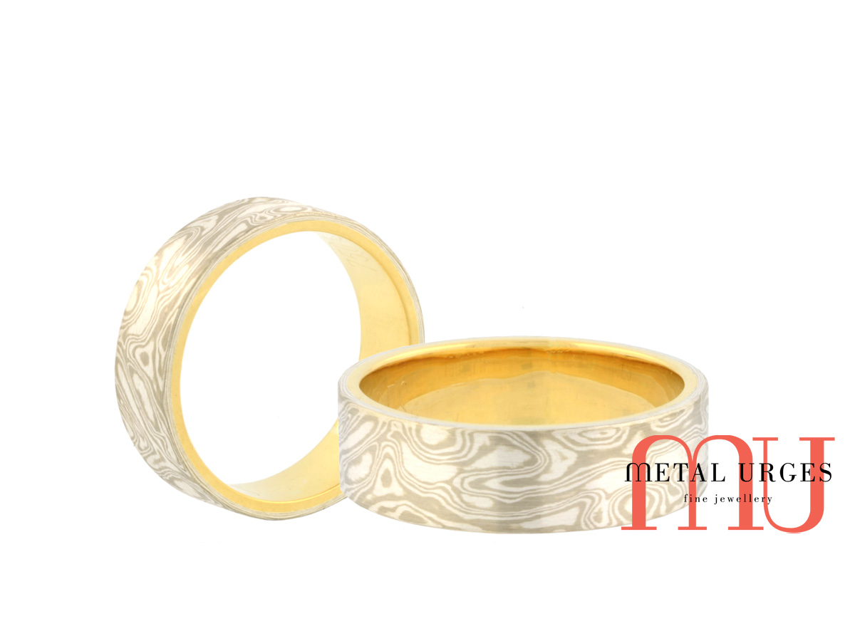 Mokume Gane wedding ring in 18ct white gold and silver, with an 18ct yellow gold lining. Custom made in Australia.