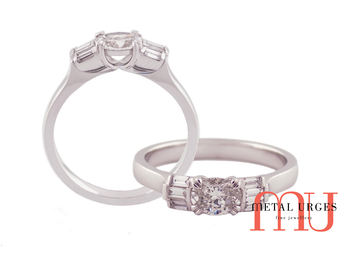 Oval natural white GIA diamond engagement ring. Handmade platinum.
