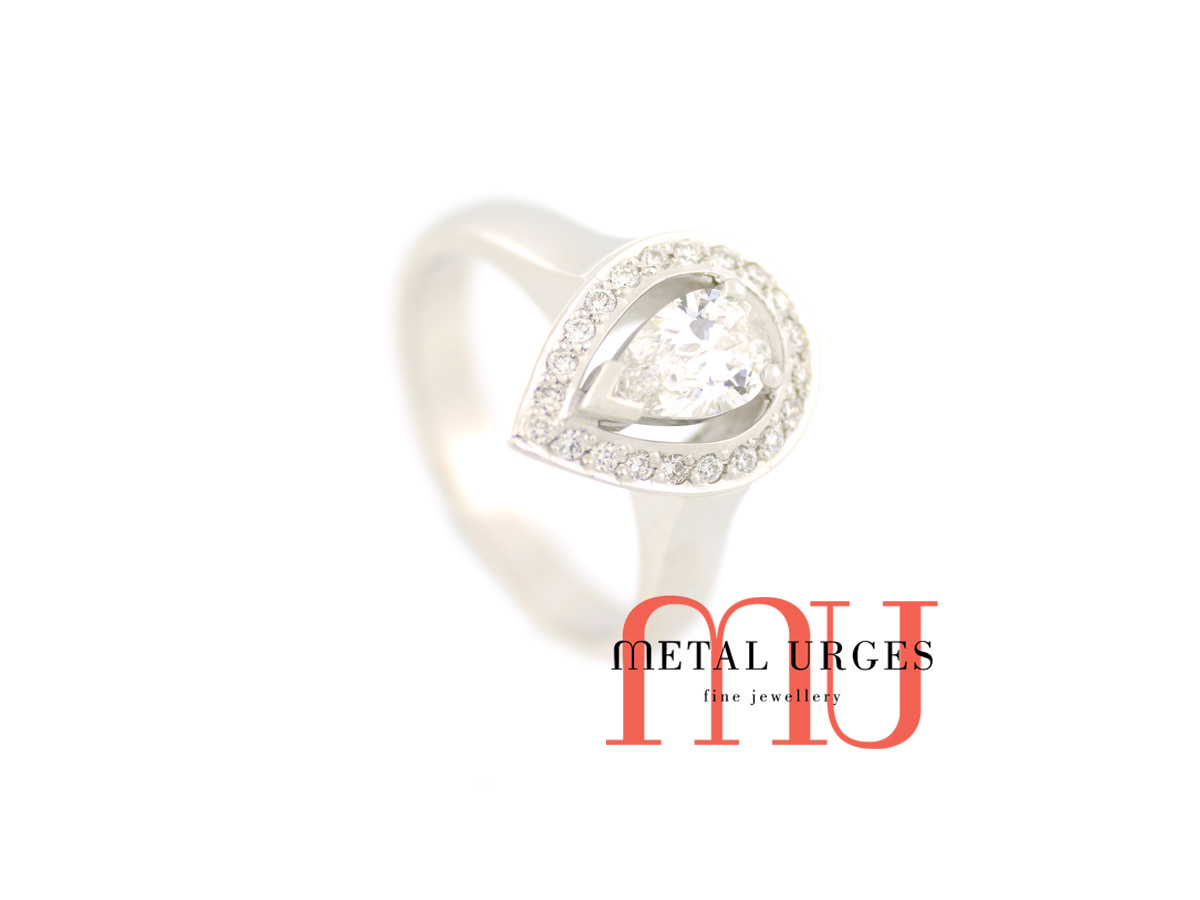 White diamond and 18ct white gold halo engagement ring. Custom made in Australia