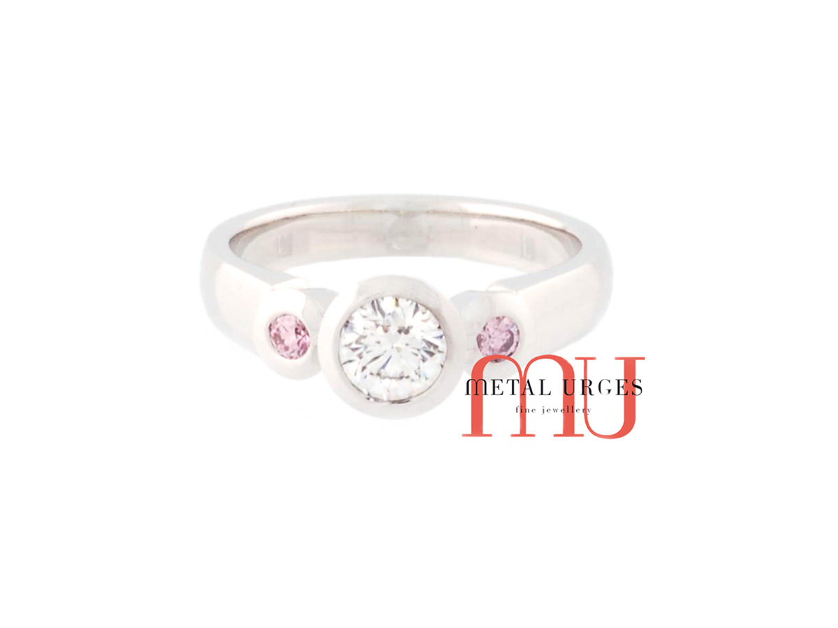 Rare pink and white diamond engagement ring in 18ct white gold. Custom made in Australia.