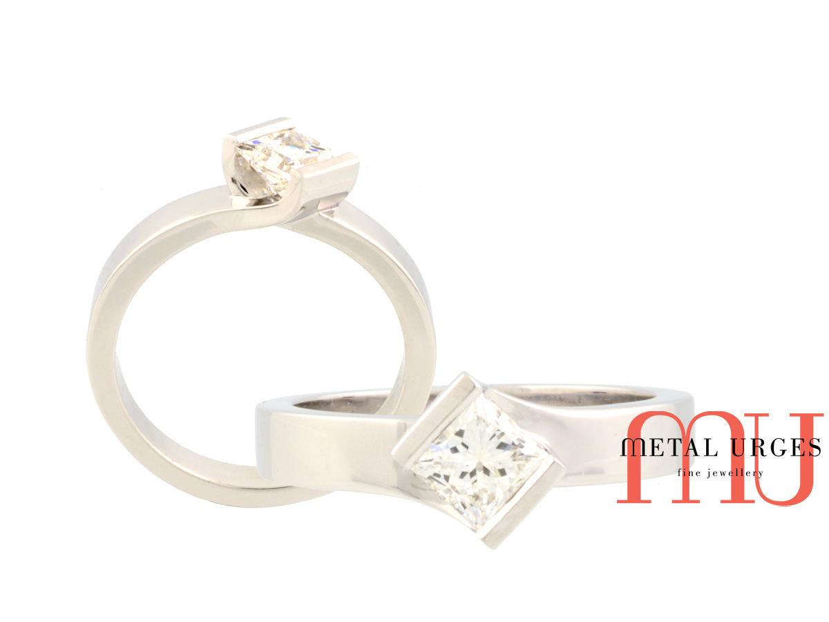 Tension set princess cut white diamond engagement ring in platinum.  Custom made in Hobart.
