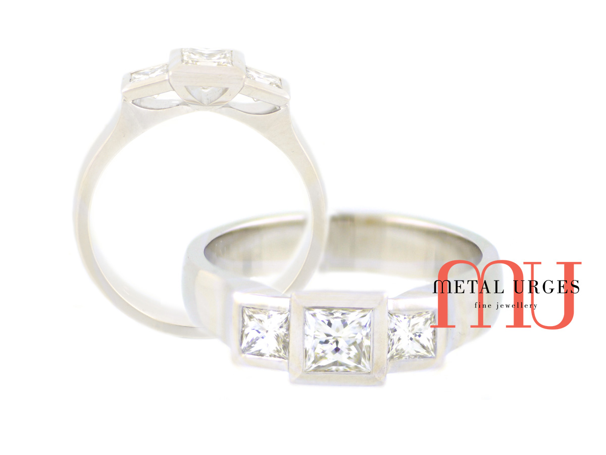 Three square princess cut white diamond and platinum engagement ring.  Custom made in Hobart.