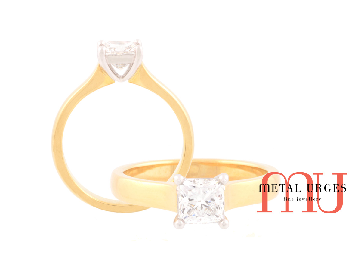 Princess cut white diamond and 18ct yellow gold engagement ring.