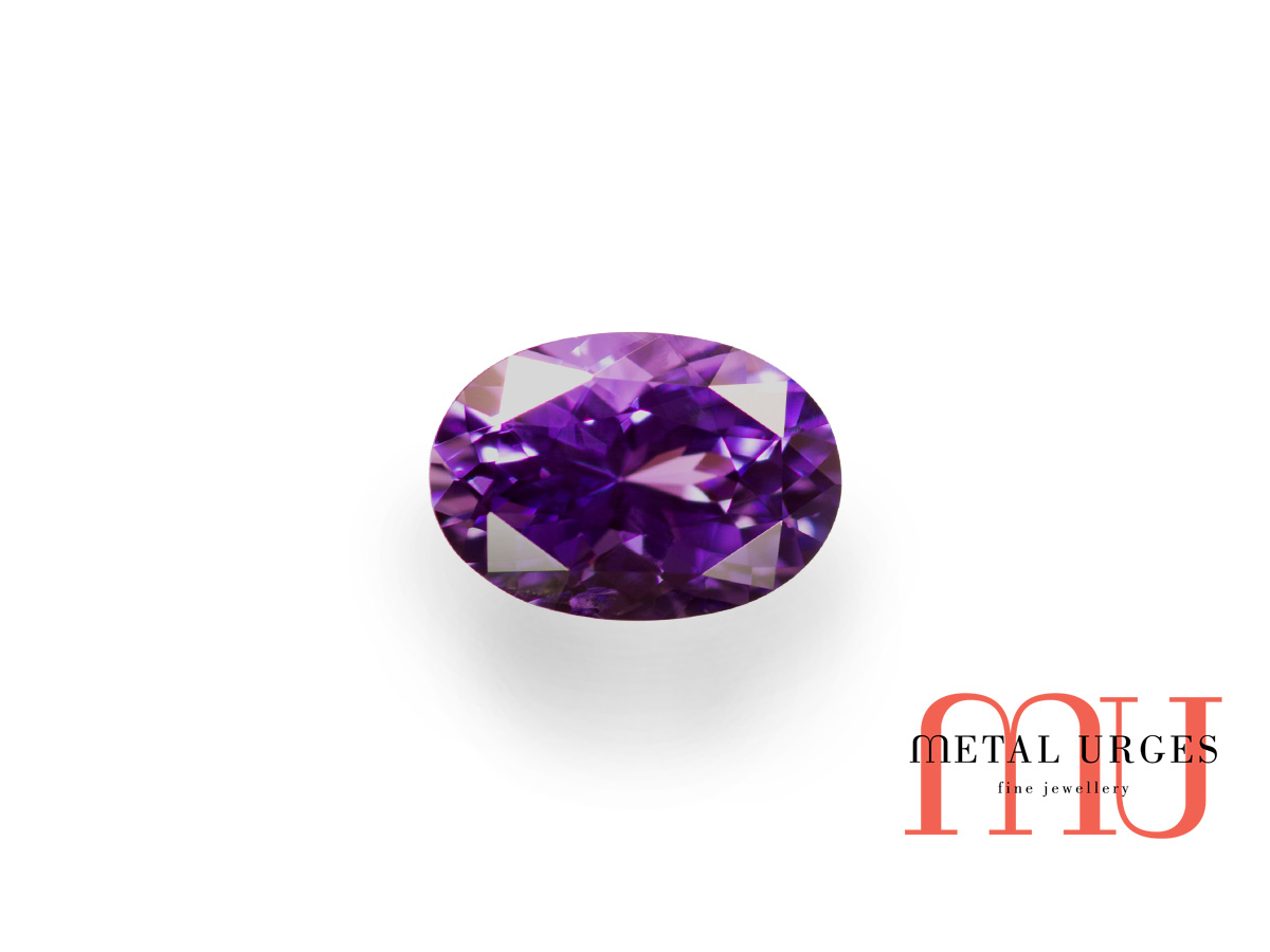 Oval cut purple sapphire