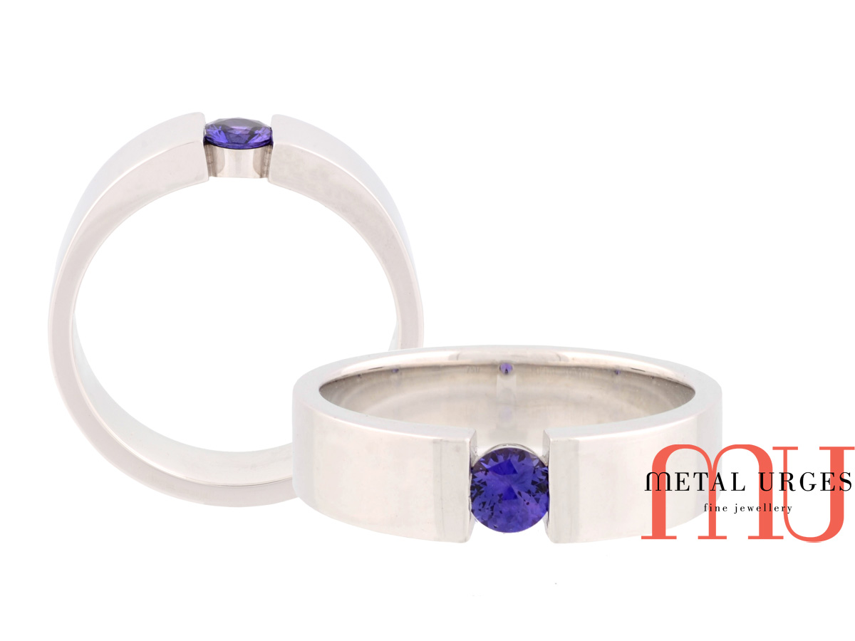 Unique purple sapphire and white gold wedding ring. Custom made in Australia.