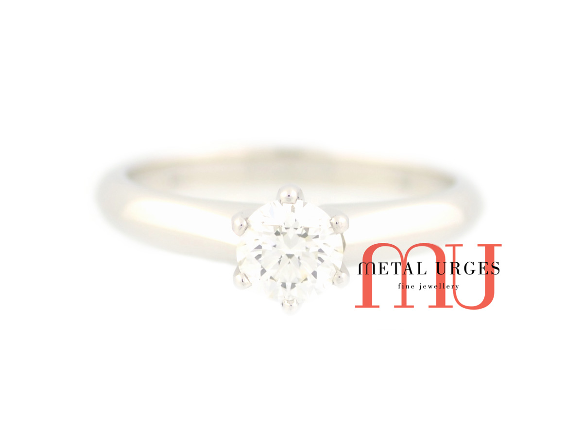 Tiffany’s inspired solitaire brilliant cut white diamond engagement ring in 18ct white gold.  Custom made in Australia.