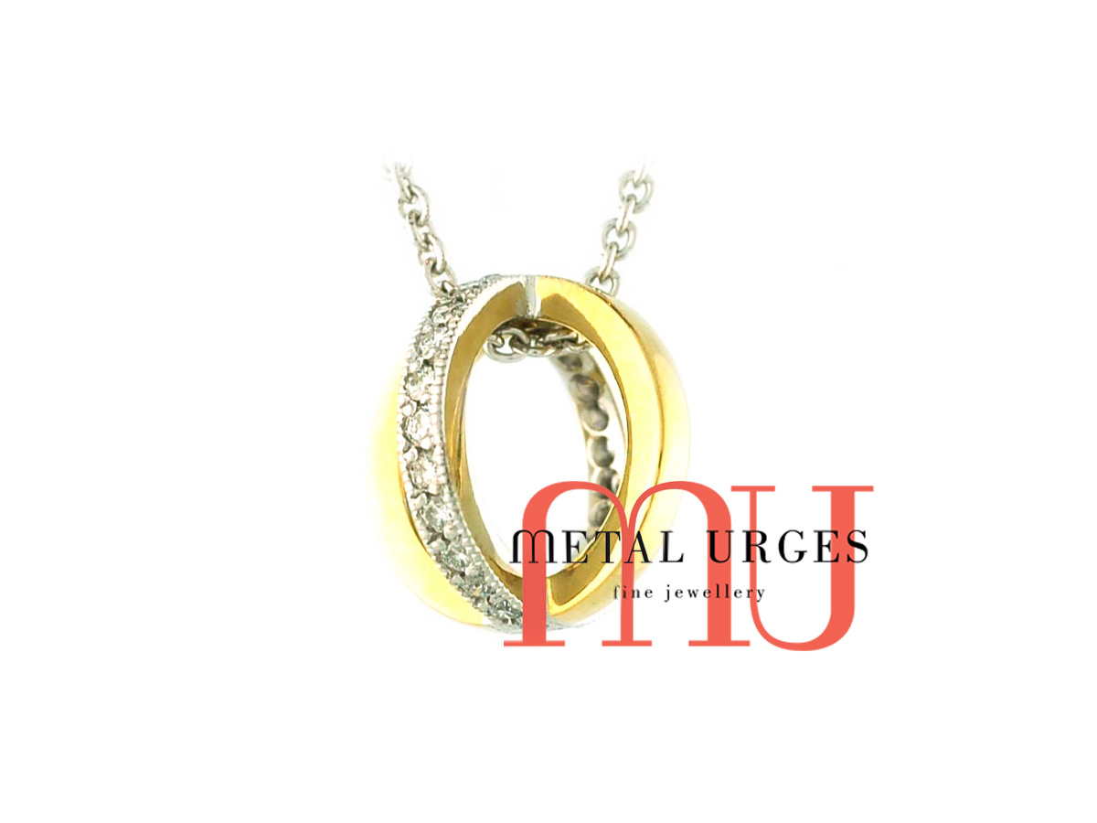 White diamond set orbit pendant necklace in 18ct white and yellow gold. Custom made in Australia.