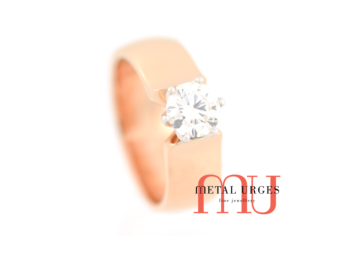 Round brilliant cut white diamond engagement ring, featuring puatinum and 18ct rose gold. Custom made in Australia.