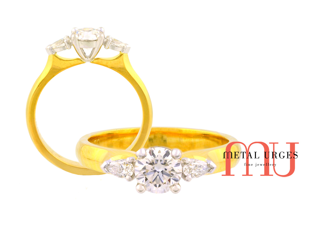 GIA certified round brilliant cut and pear shaped GIA certified white diamond engagement ring in 18ct white and yellow gold.  Custom made in Hobart.