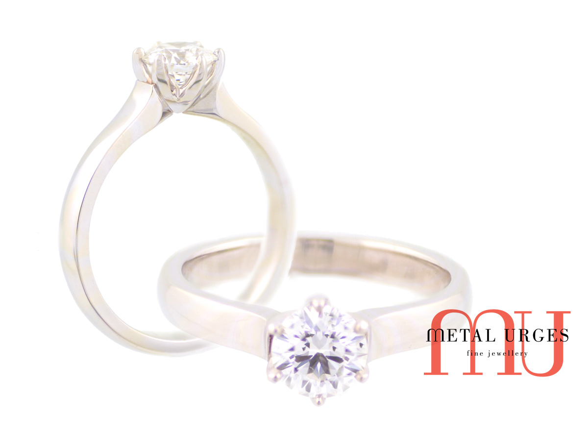 Tiffany inspired classic six claw 18ct white gold and natural round brilliant cut GIA certified white diamond engagement ring.  Custom made in Hobart.