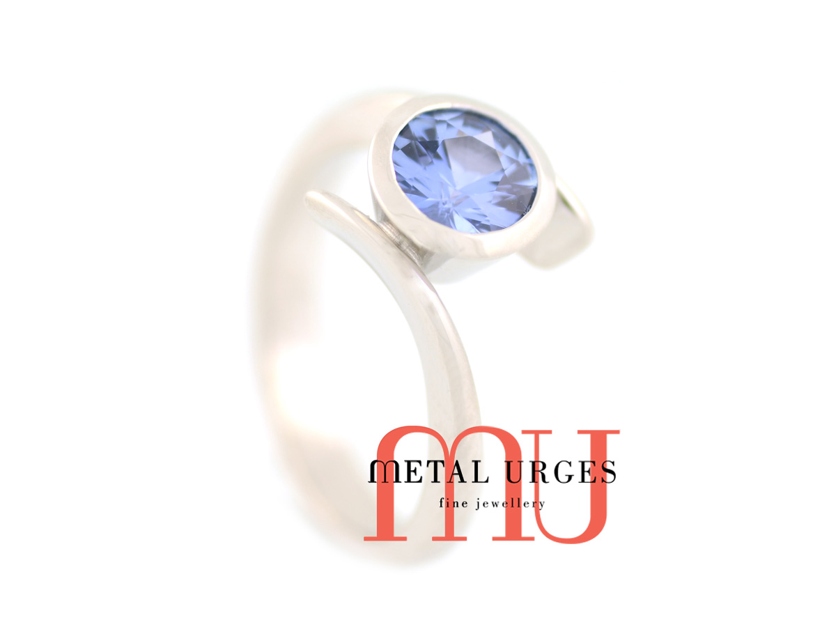 Blue sapphire and platinum engagement ring. Custom made in Australia.