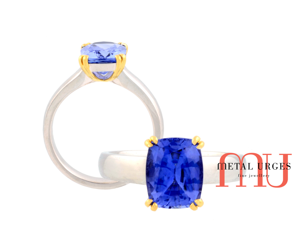 Vibrant blue sapphire and 18ct gold ring. Custom made in Australia.
