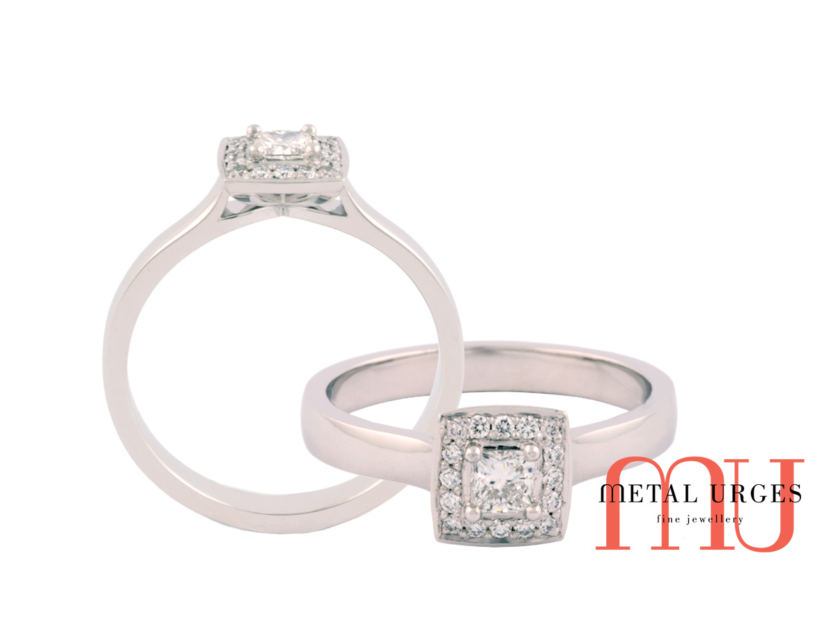 Princess cut white diamond in square grain set modern cluster setting