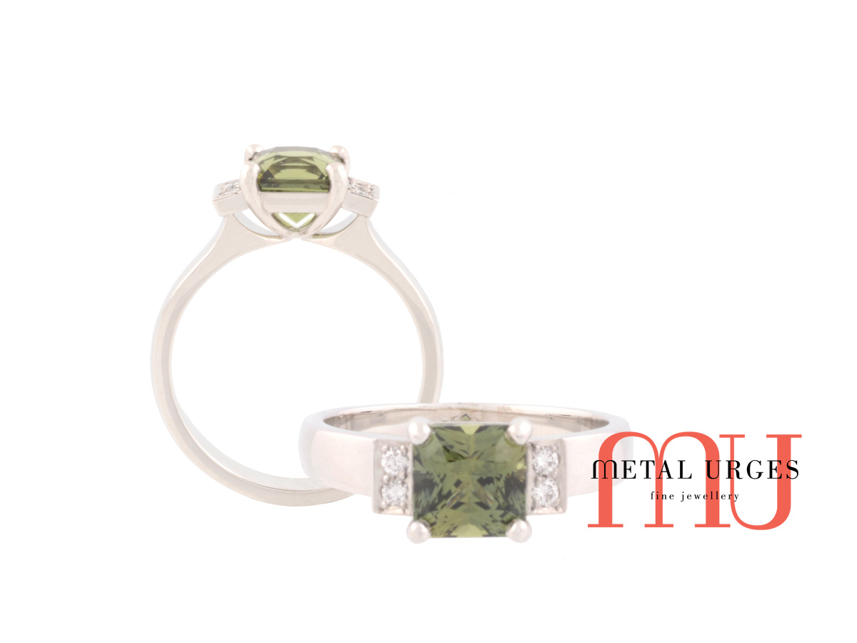 Green sapphire and white diamond engagement ring in platinum. Custom made in Australia.