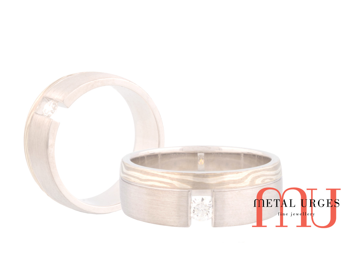 Semi tension set round white diamond and mokume gane engagement ring. Custom made in Australia.