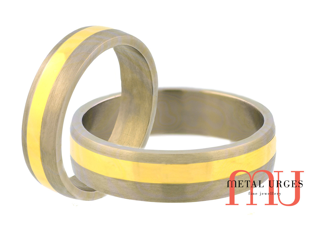 Directionally brushed matt finish titanium and 18ct yellow wedding ring. Custom made in Australia.