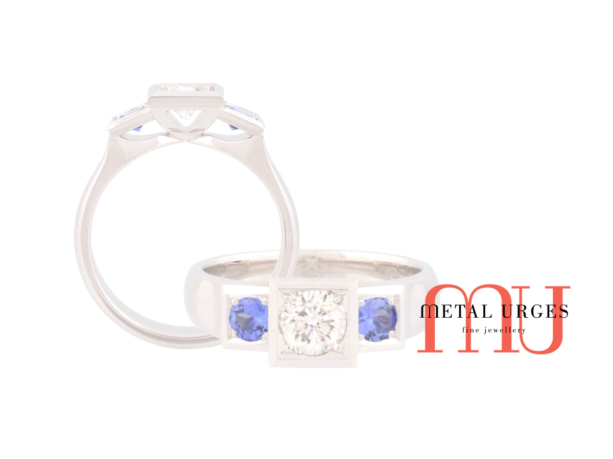 Round brilliant cut white diamond and blue sapphire engagement ring in 18ct white gold.  Hand made in Hobart.