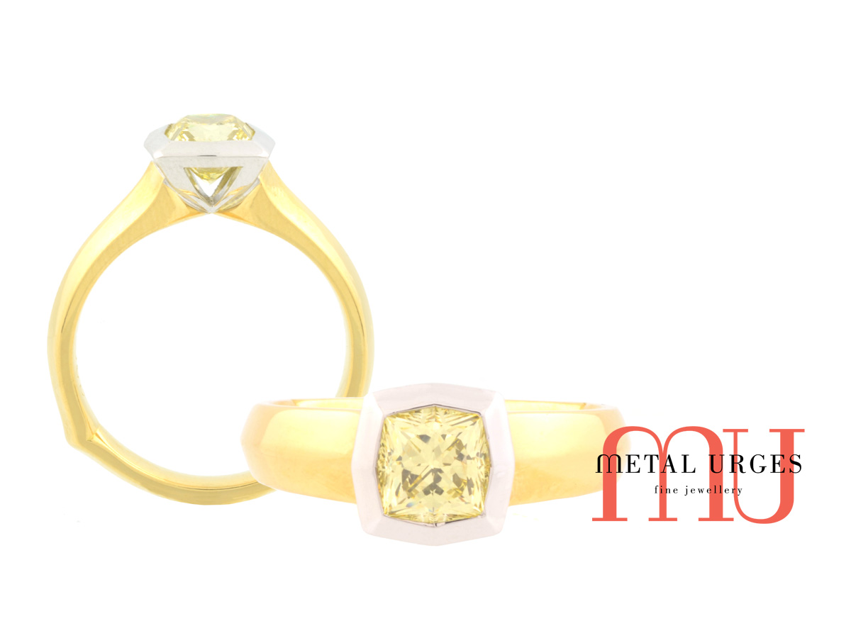 Unique canary diamond ring in 18ct white and yellow gold. Custom made in Australia.